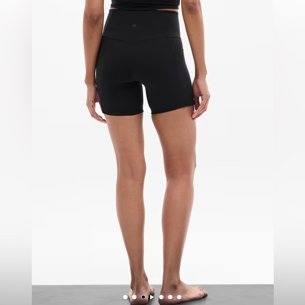 Athleta Salutation stash pocket 7” inseam Black Bike Shorts